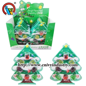 árvore de natal mastigando bala de goma